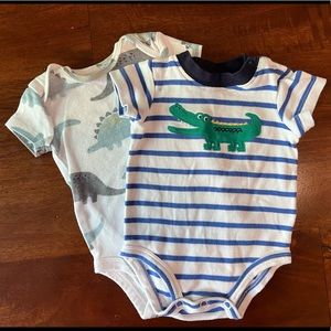 Two Carter’s onesies size 0-3 months